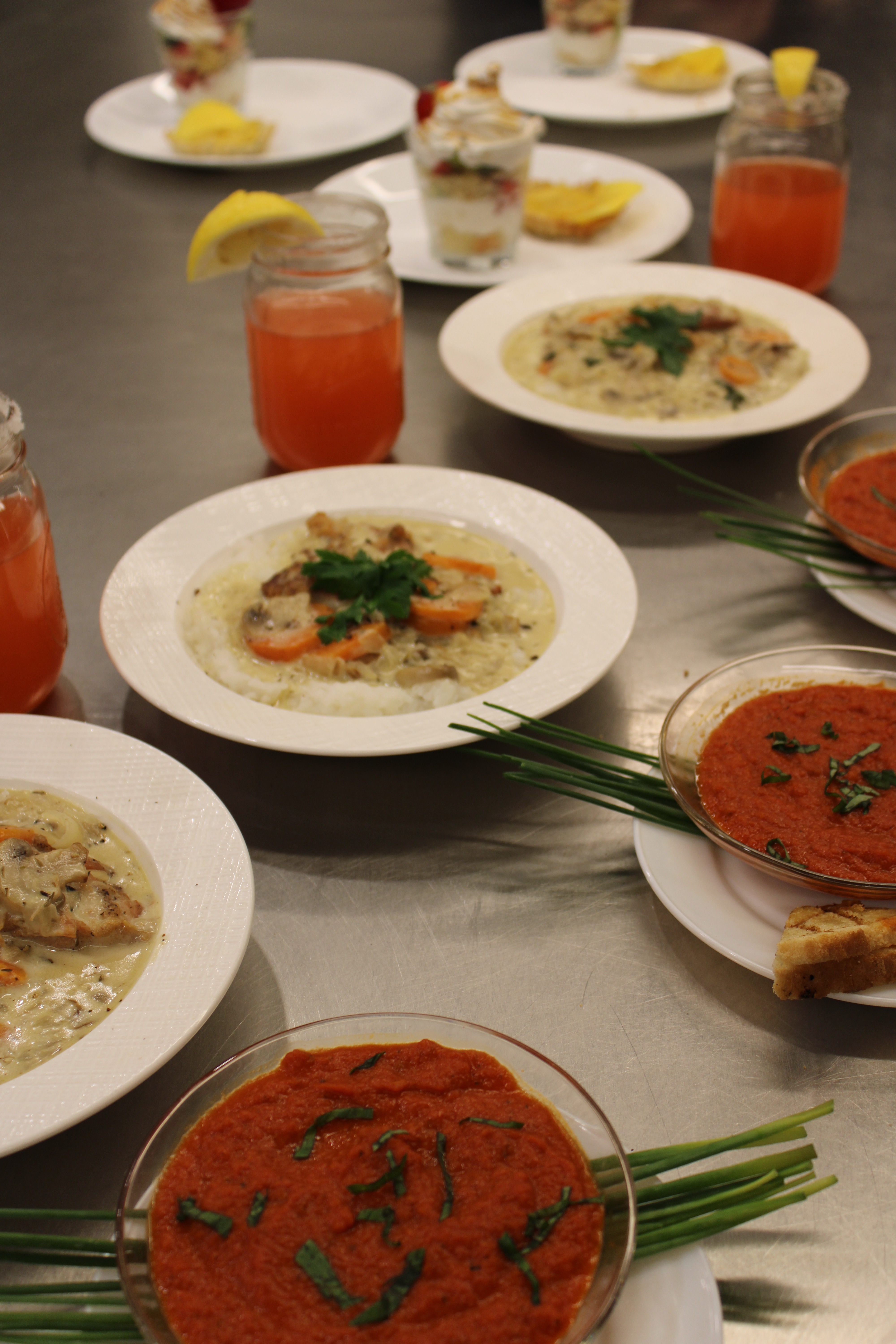 Beautifully plated dishes and beverages made by Summer Culinary campers